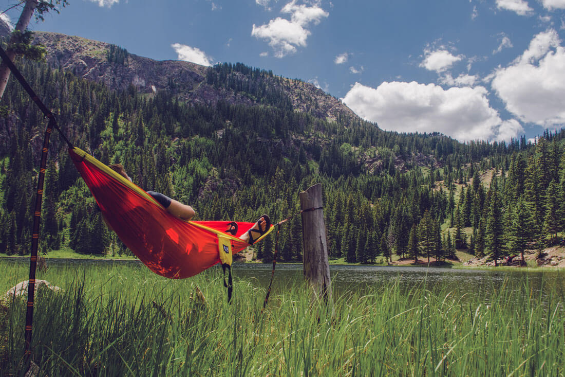 blue_sky_and_green_grassland_with_a_red_people.jpg